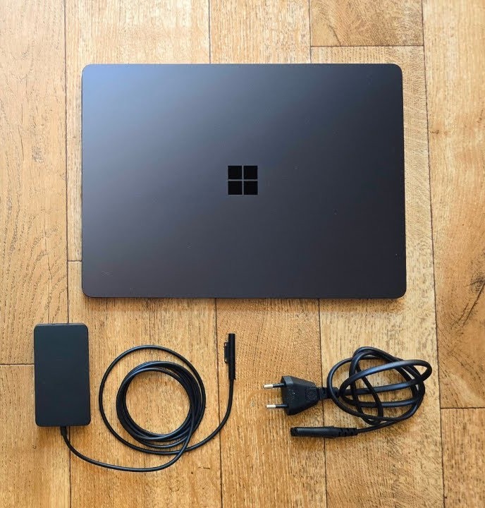 Surface Laptop 7 with its Compact Power Adapter.