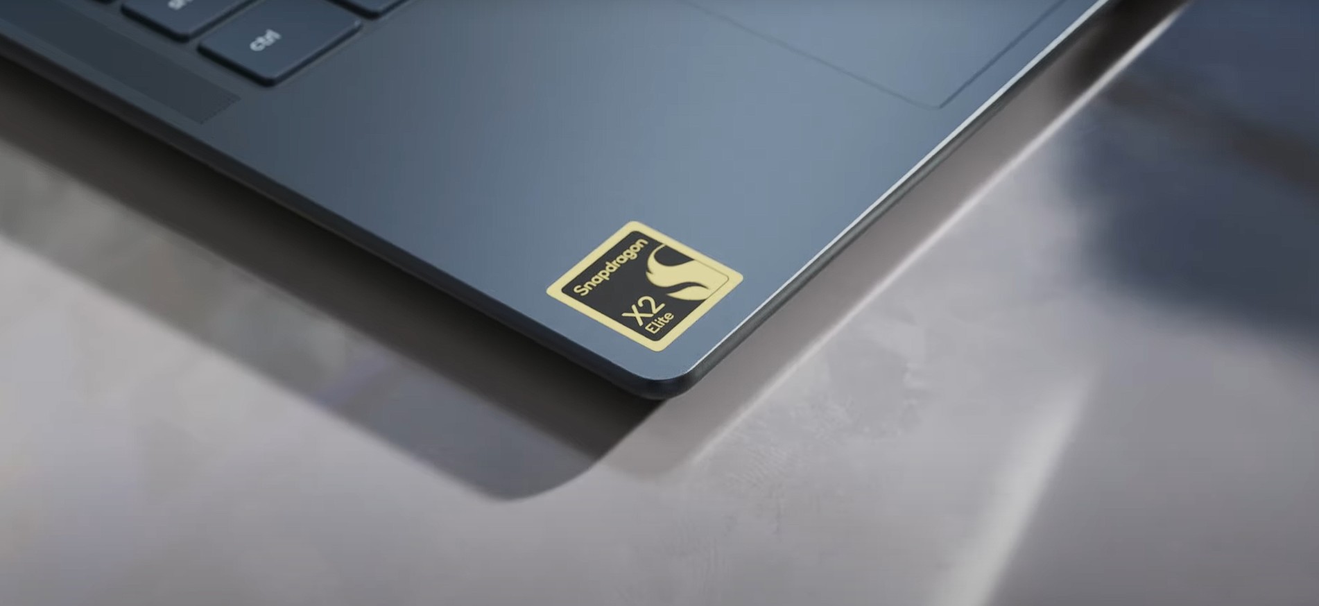 Snapdragon X2 Elite sticker on a Lenovo Yoga Slim 7X