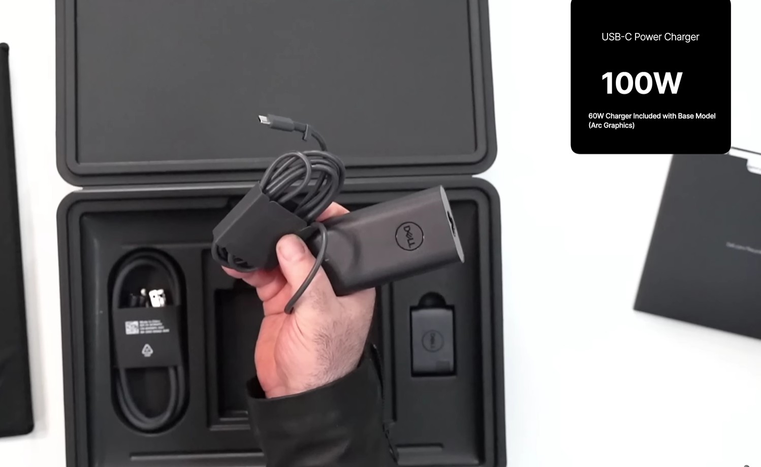 Dell XPS 14 2025 100W charger in box by Andrew Mark David on YouTube