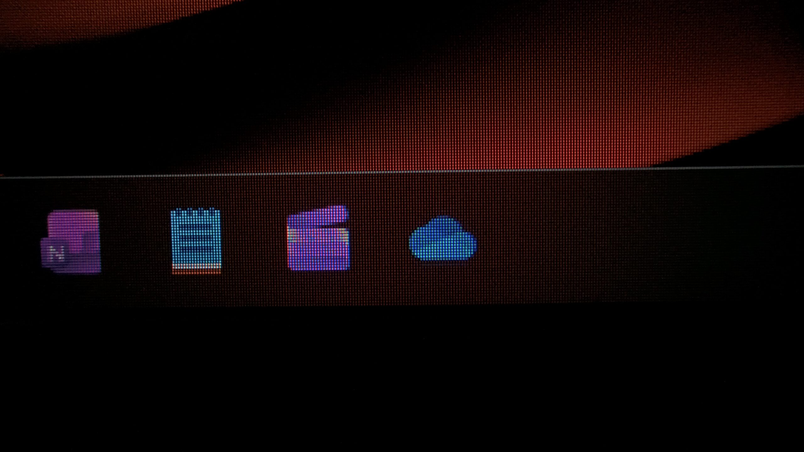 Microsoft Clipchamp and OneDrive apps on Windows 11 taskbar with OneNote and Notepad nearby